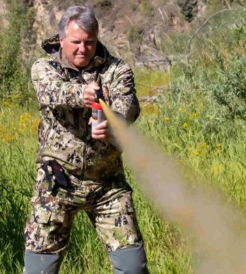 Person spraying bear spray